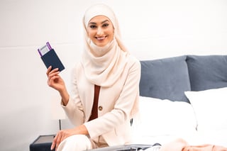 A Muslim Young Woman Holding Passport 