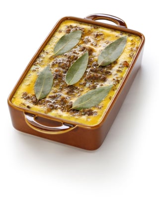 Bobotie (baked egg on a curry flavored meatloaf top)