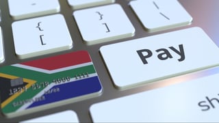 Bank card featuring flag of South Africa as a key on a computer keyboard