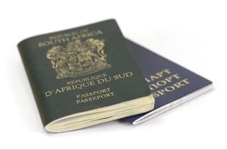 South African and Belarussian Passport on white background
