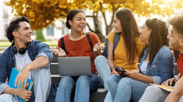 Students Sitting On The Stairs Of A Campus
