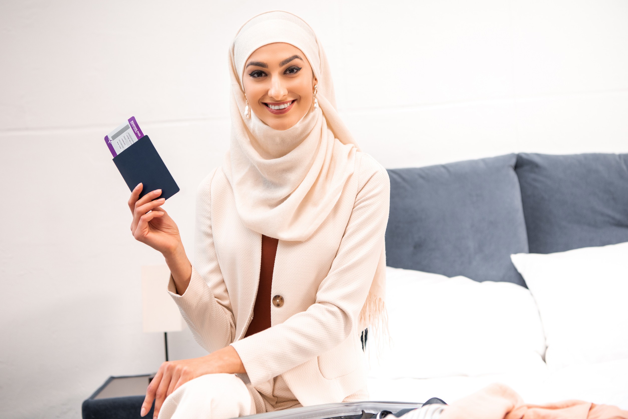 A Muslim Young Woman Holding Passport 