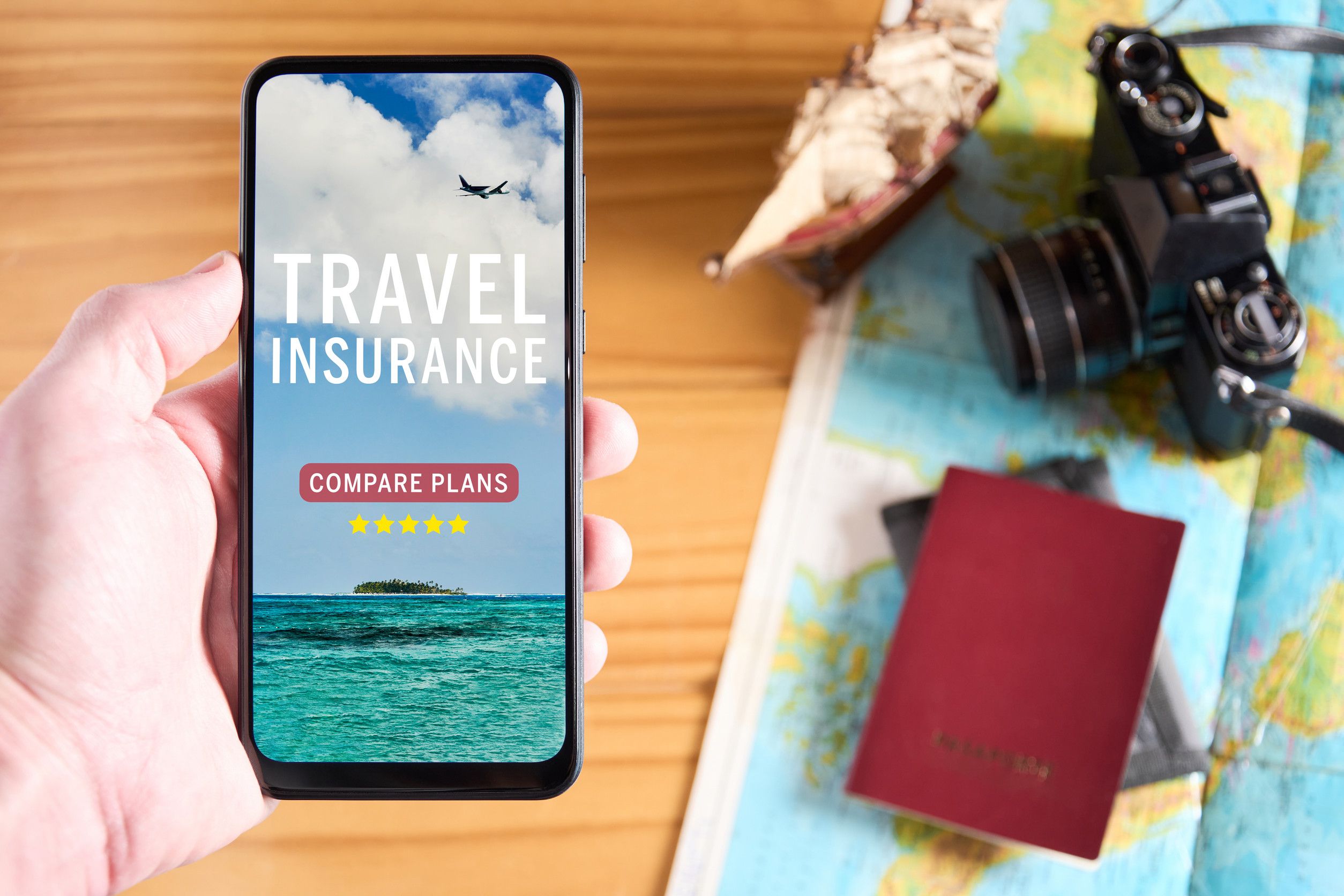 A phone displaying a travel insurance app
